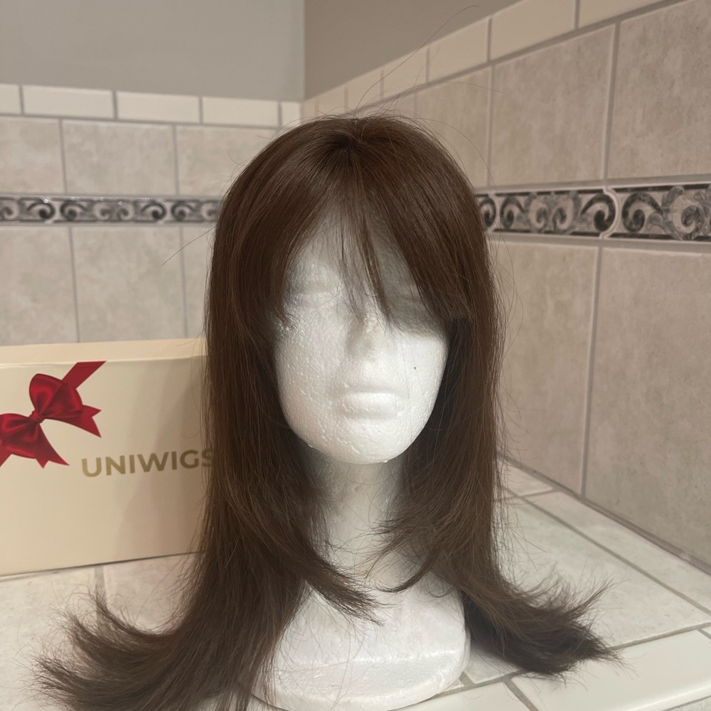 Uniwigs “Amber” human hair topper dark brown